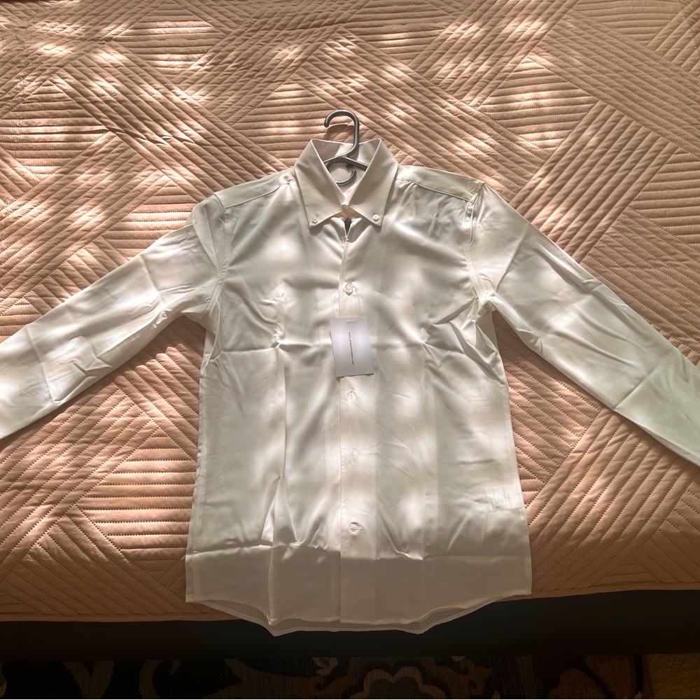 Brand new Size Med Stretch Fit
dress shirt